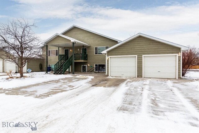 view of front of house with a garage and covered porch