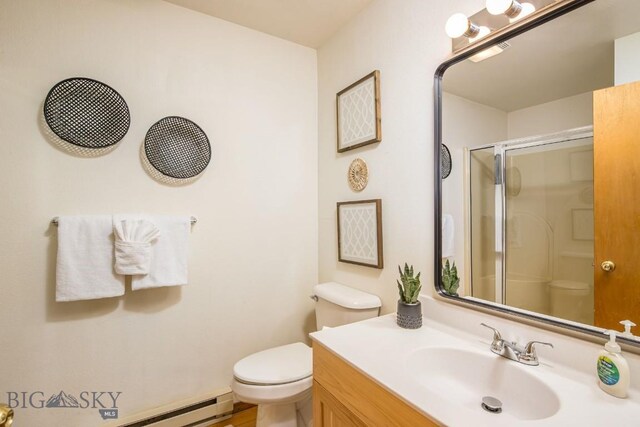 bathroom with baseboard heating, toilet, vanity, and walk in shower