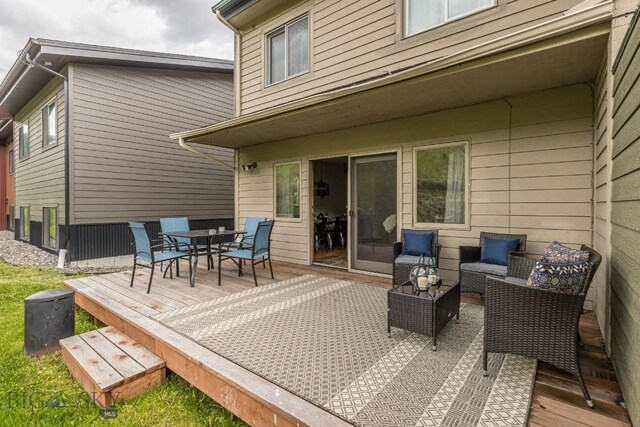 deck with outdoor lounge area