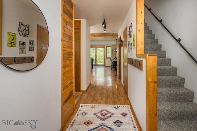 85 Spruce Cone Unit 10, Big Sky, MT 59716 - hallway featuring light wood-style flooring and stairway