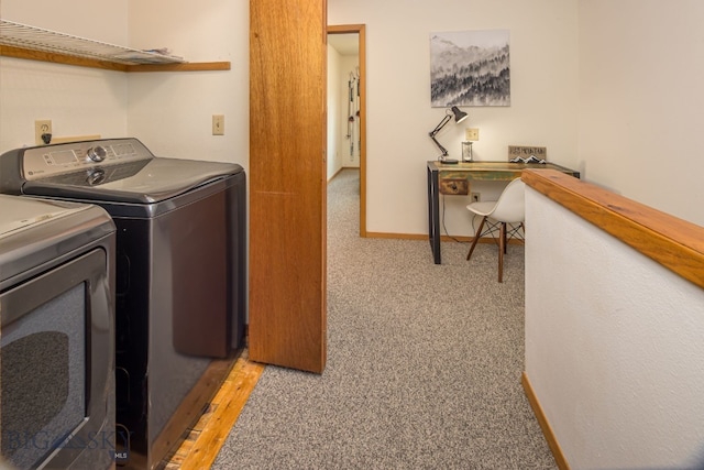 laundry room featuring light colored carpet and independent washer and dryer