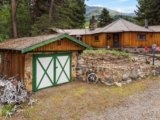 exterior space featuring a mountain view