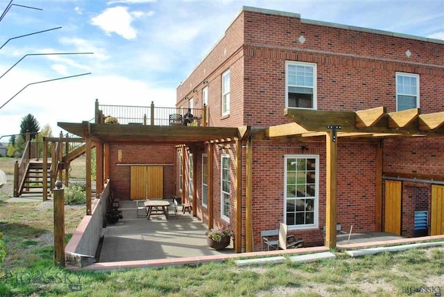 rear view of house with a patio area