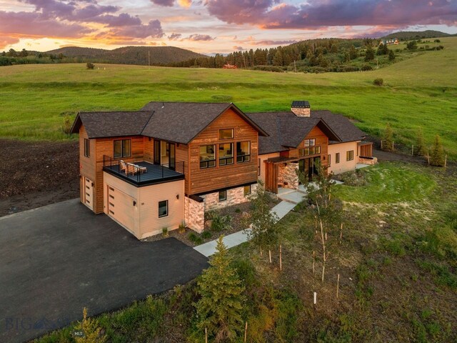 aerial view at dusk with a rural view