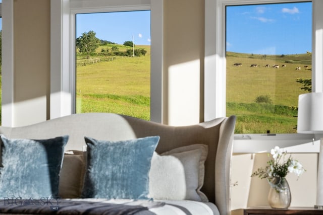 sunroom with a rural view