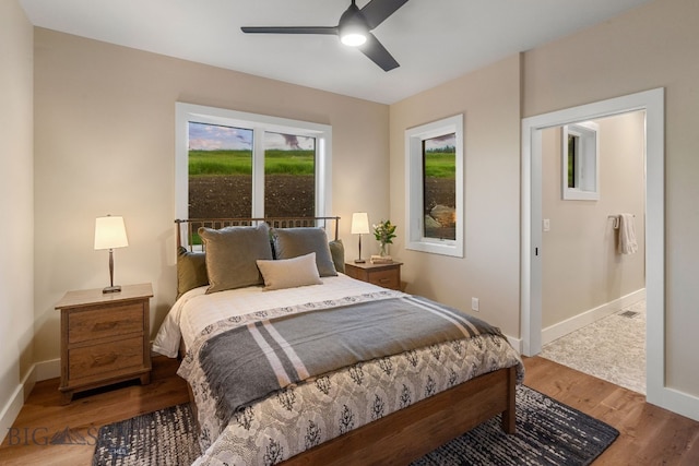 bedroom featuring ceiling fan and hardwood / wood-style flooring