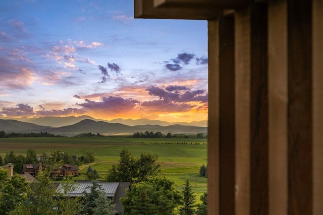 view of mountain feature with a rural view