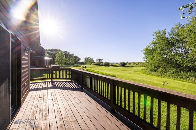 deck featuring a lawn