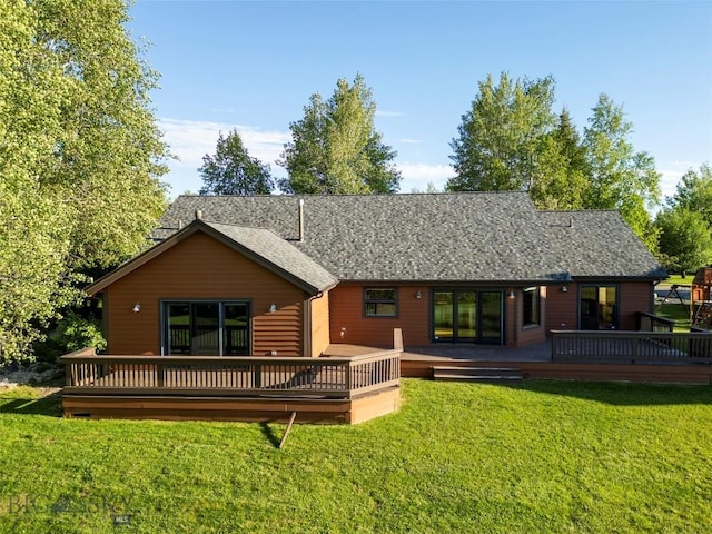 3127 Augusta Dr, Bozeman, MT 59715 - back of property featuring a wooden deck, a lawn, and a shingled roof