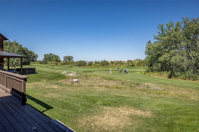 3127 Augusta Dr, Bozeman, MT 59715 - view of grassy yard featuring a deck