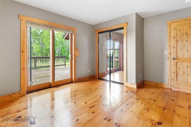 3127 Augusta Dr, Bozeman, MT 59715 - doorway featuring plenty of natural light, baseboards, and wood-type flooring