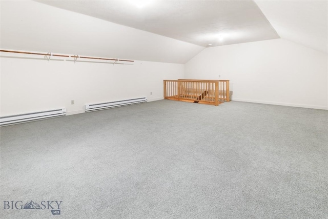 3127 Augusta Dr, Bozeman, MT 59715 - bonus room featuring baseboard heating, vaulted ceiling, and carpet