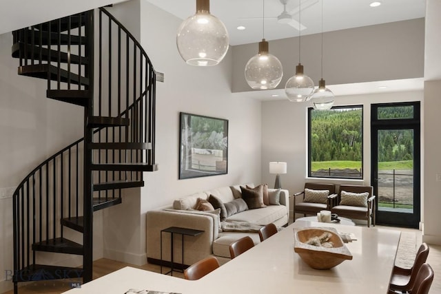 211 Town Center Ave Unit 3G, Big Sky, MT 59716 - dining area with stairway, a towering ceiling, and recessed lighting