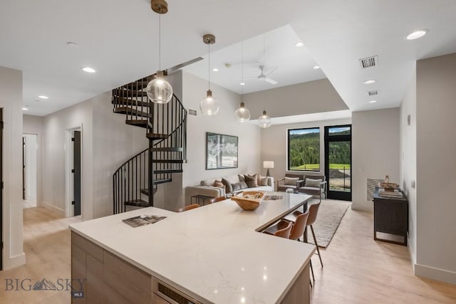211 Town Center Ave Unit 3G, Big Sky, MT 59716 - dining room featuring stairway, recessed lighting, light wood finished floors, and a ceiling fan