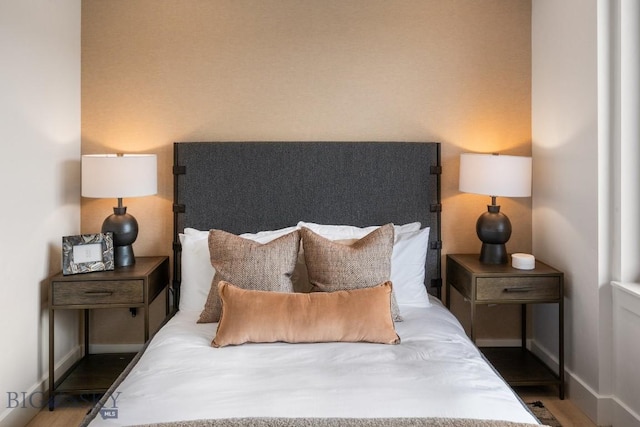 bedroom featuring dark wood-type flooring