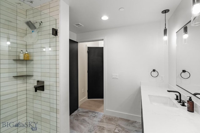 211 Town Center Ave Unit 3G, Big Sky, MT 59716 - full bathroom with marble finish flooring, a shower stall, vanity, and recessed lighting