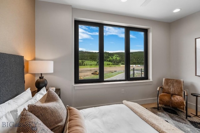 bedroom featuring hardwood / wood-style floors