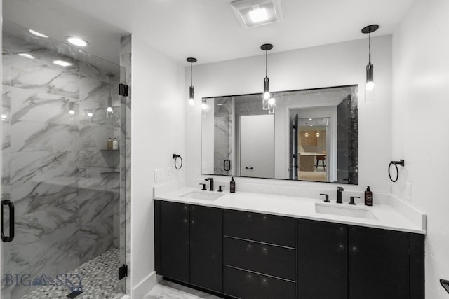 211 Town Center Ave Unit 3G, Big Sky, MT 59716 - bathroom featuring a marble finish shower and double vanity