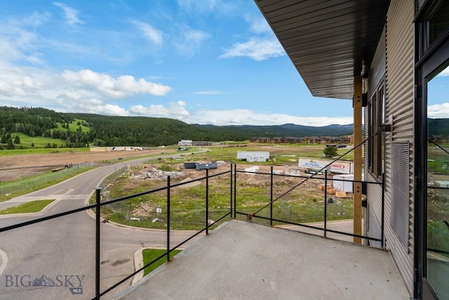 balcony featuring a mountain view