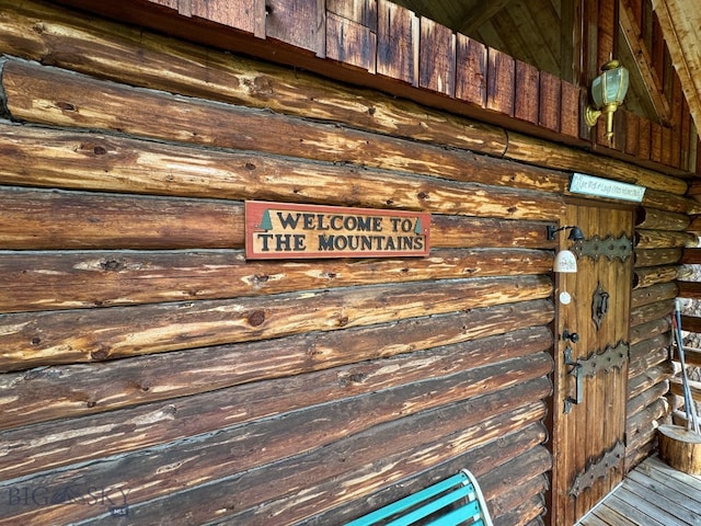 exterior details featuring hardwood / wood-style floors