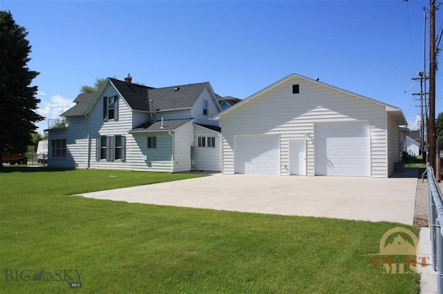 exterior space with a front lawn and a garage