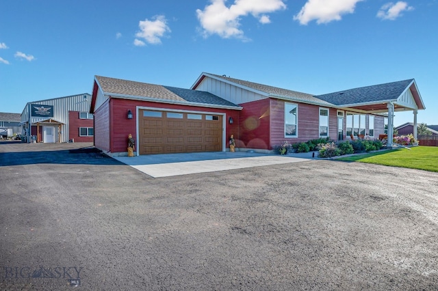 single story home featuring a garage