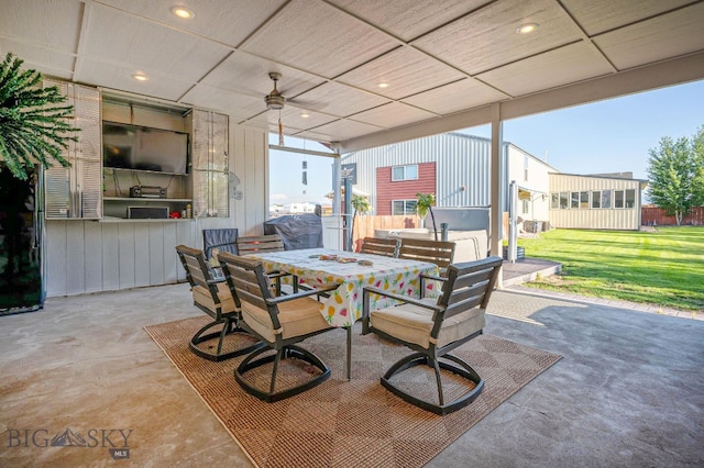 view of patio featuring ceiling fan