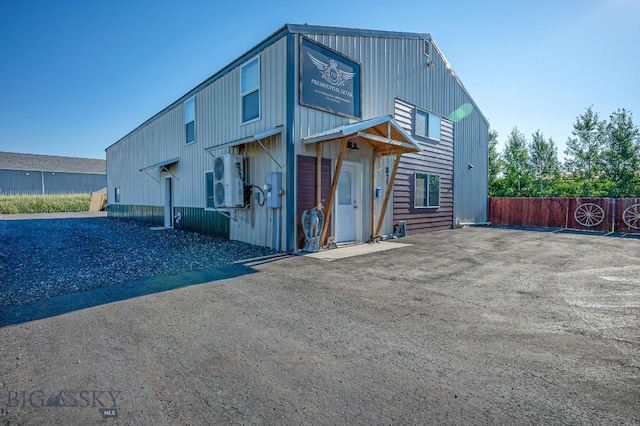 view of front of house featuring ac unit