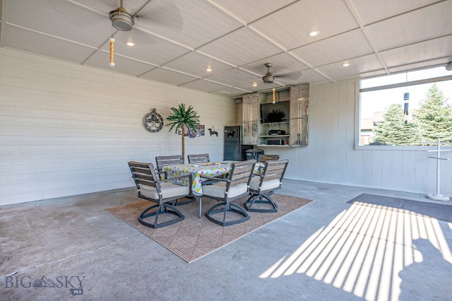 view of patio featuring ceiling fan