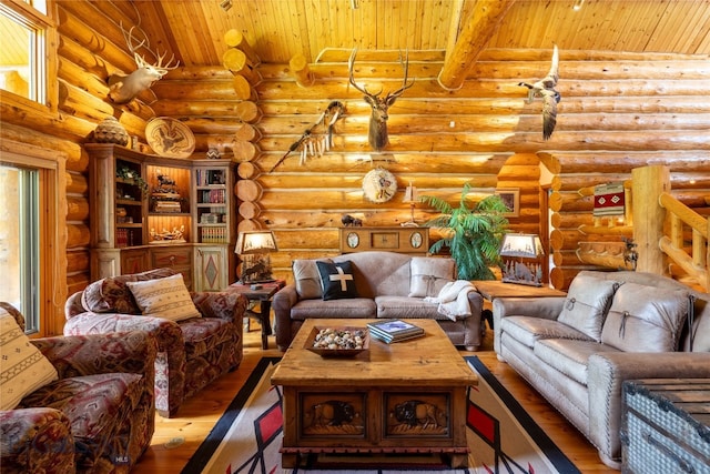 living room with wooden ceiling, hardwood / wood-style flooring, and rustic walls