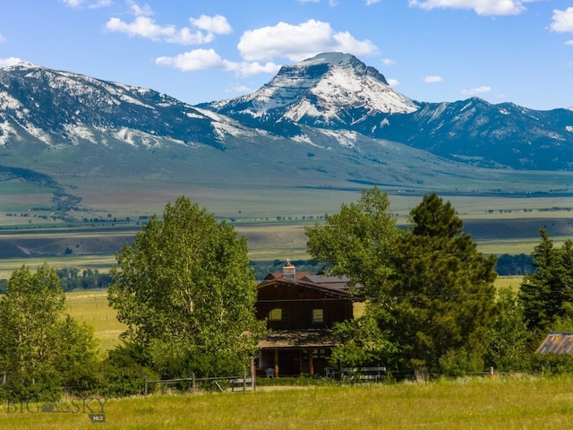 mountain view featuring a rural view