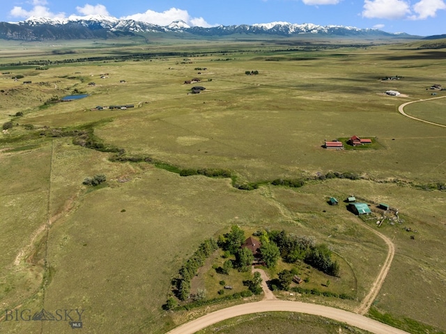 bird's eye view featuring a mountain view and a rural view