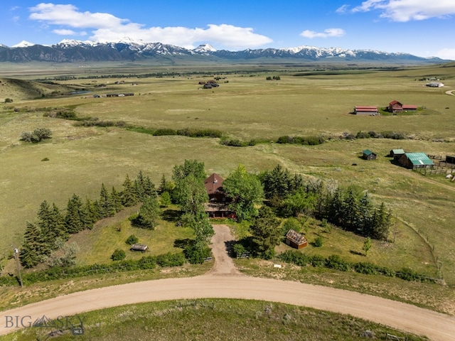 drone / aerial view with a mountain view and a rural view