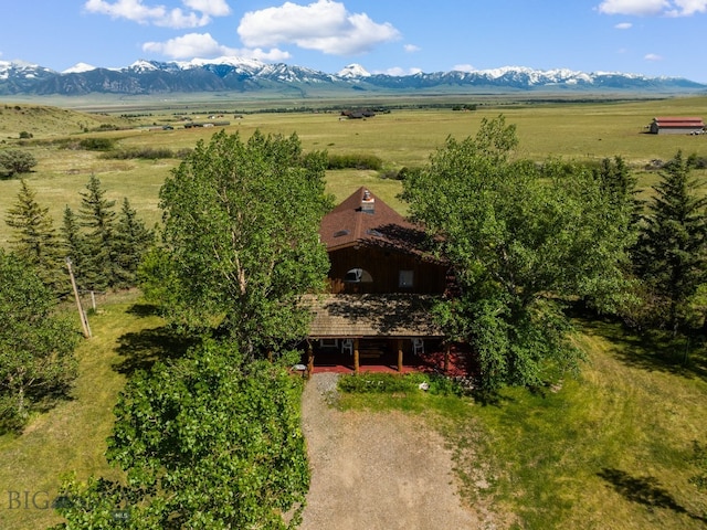 bird's eye view featuring a mountain view and a rural view