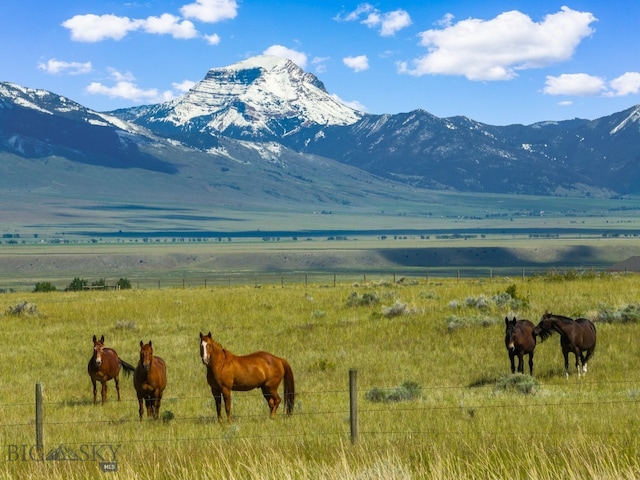 view of mountain feature with a rural view