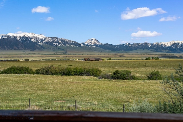 view of mountain feature with a rural view