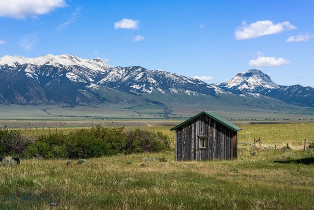 view of mountain feature with a rural view