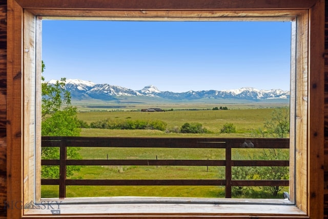 view of mountain feature with a rural view