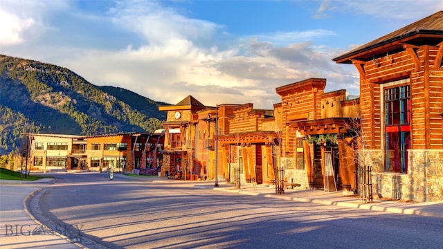 view of building exterior featuring a mountain view