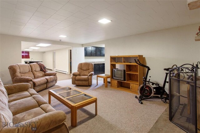 carpeted living area featuring a baseboard radiator