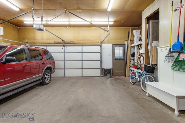 garage featuring a garage door opener