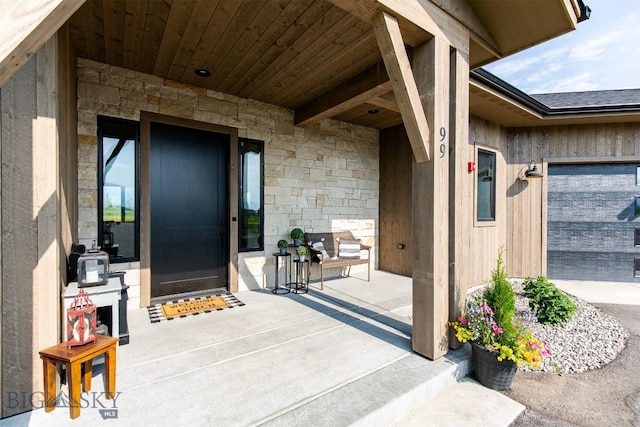 property entrance featuring a garage