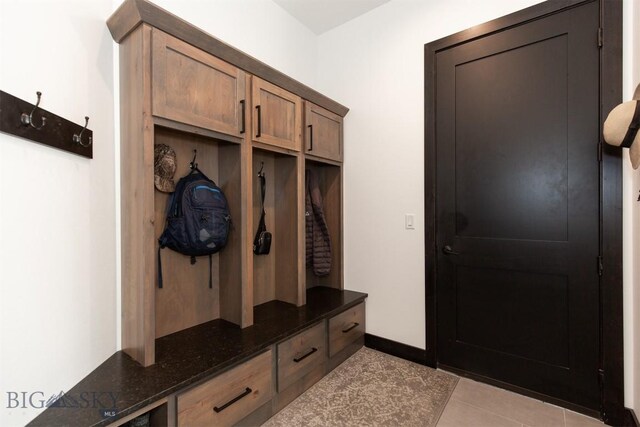 mudroom featuring light tile patterned floors