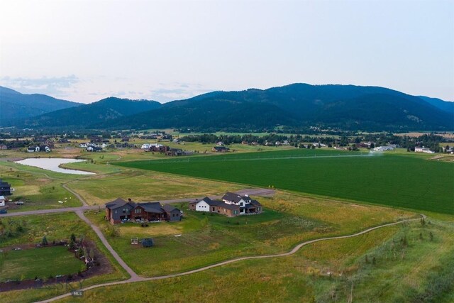 bird's eye view featuring a mountain view and a rural view