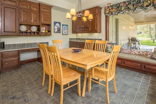 dining room featuring a notable chandelier