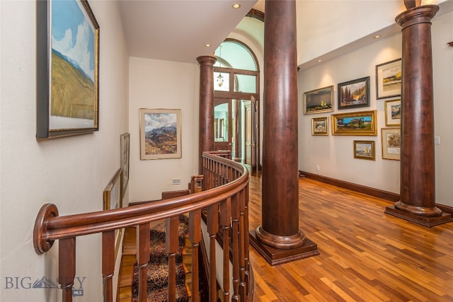 corridor featuring hardwood / wood-style floors