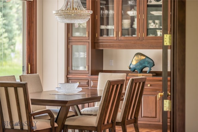 dining room with hardwood / wood-style flooring