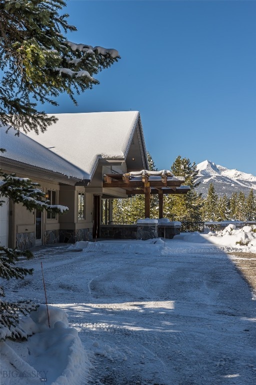 exterior space featuring a mountain view