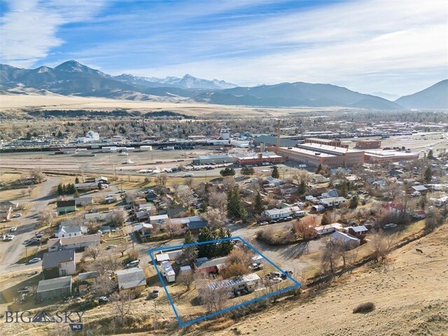 bird's eye view with a mountain view