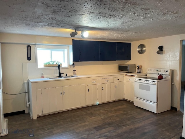 kitchen with dark hardwood / wood-style flooring, sink, white electric range oven, and a textured ceiling